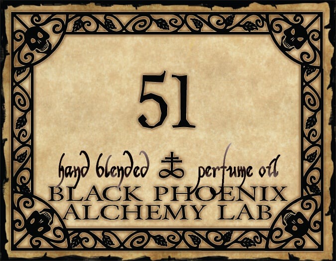 Label for a hand blended perfume oil by Black Phoenix Alchemy Lab with decorative border and number 51.