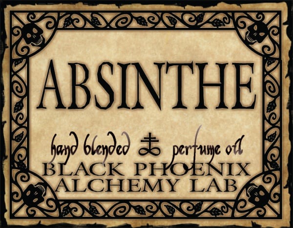 Absinthe hand blended perfume oil by Black Phoenix Alchemy Lab with decorative border