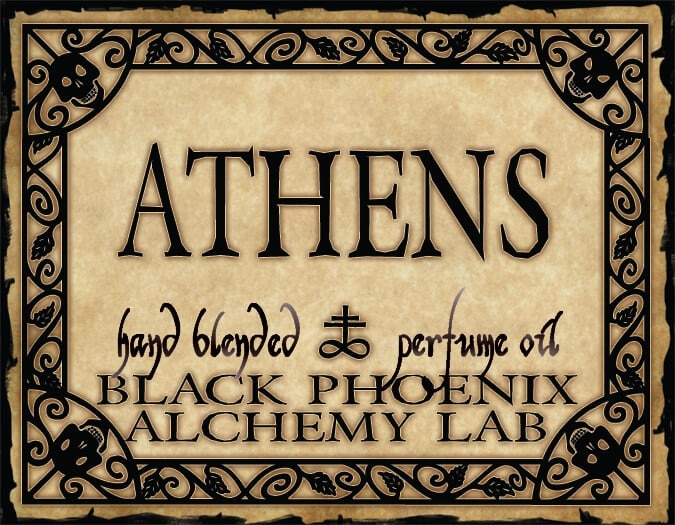 Label for Athens hand blended perfume oil by Black Phoenix Alchemy Lab with decorative border and text.