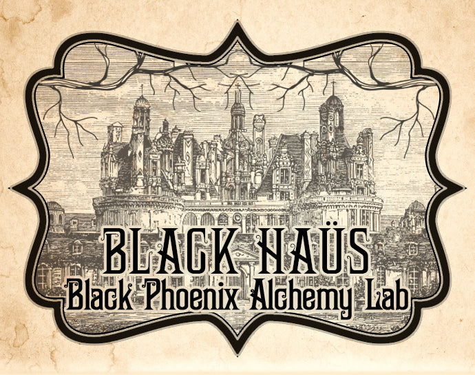 Vintage-style label with castle illustration and 'Black Haus Black Phoenix Alchemy Lab' text on a textured background.