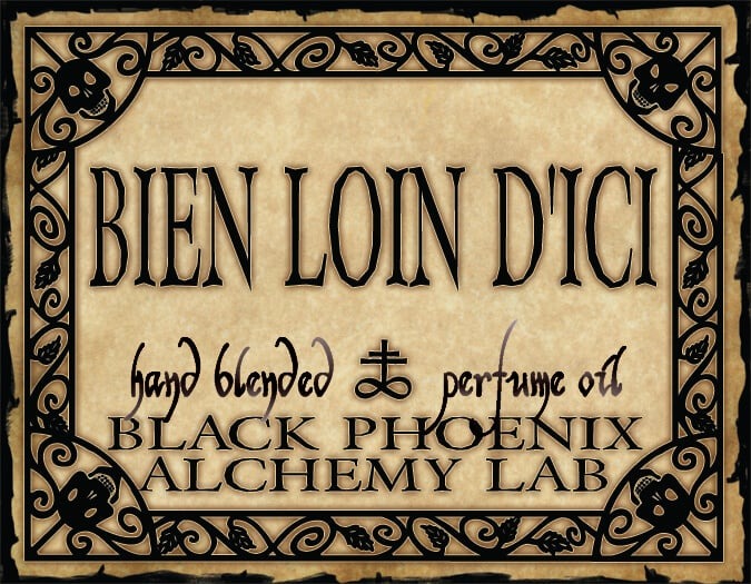 Label for 'Bien Loin D'Ici' perfume oil by Black Phoenix Alchemy Lab with decorative border.