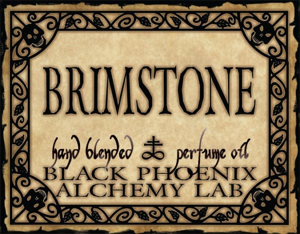 Brimstone perfume oil label from Black Phoenix Alchemy Lab with decorative border and text.