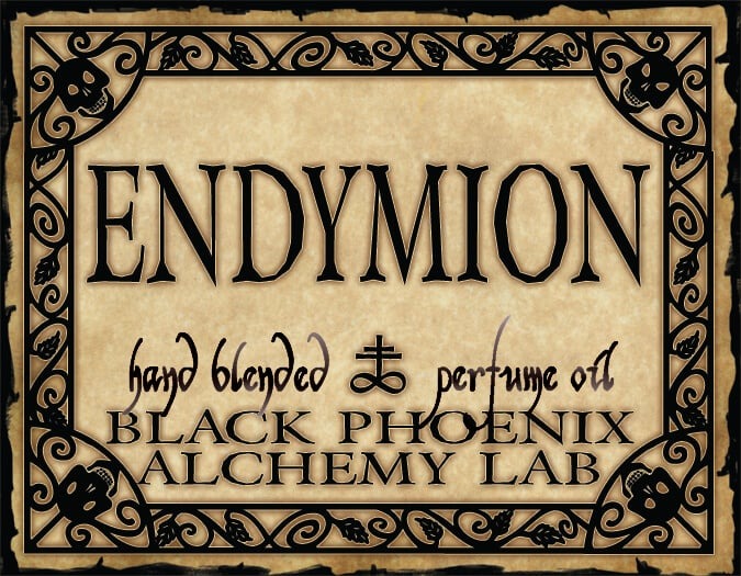 Label for Endymion hand blended perfume oil by Black Phoenix Alchemy Lab with decorative border.