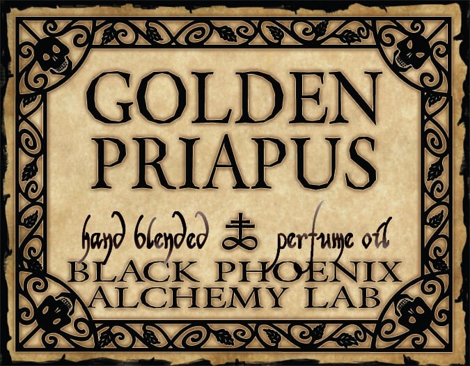 Label for 'Golden Priapus' hand blended perfume oil by Black Phoenix Alchemy Lab with decorative border.