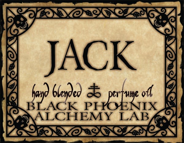 Label for 'Jack' hand blended perfume oil by Black Phoenix Alchemy Lab with decorative border.