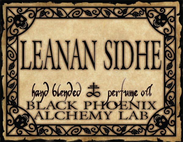 Label for Leanan Sidhe perfume oil by Black Phoenix Alchemy Lab with decorative border.