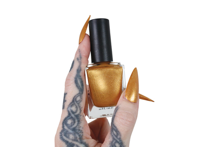 Black Phoenix Alchemy Lab Mead Moon claw polish swatch, gold microsparkle finish on nails
