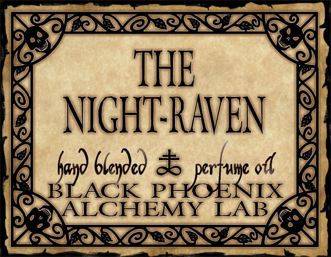 Advertisement for 'The Night-Raven' perfume oil by Black Phoenix Alchemy Lab with decorative border and text.