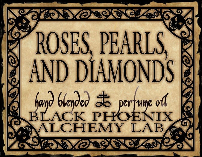 Vintage-style label for 'Roses, Pearls, and Diamonds' perfume oil by Black Phoenix Alchemy Lab.