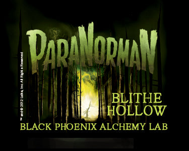 Promotional graphic for 'Paranorman' with a dark forest and glowing light, featuring 'Black Phoenix Alchemy Lab'.