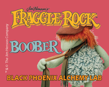 Boober from Fraggle Rock with a red background and text about Black Phoenix Alchemy Lab.