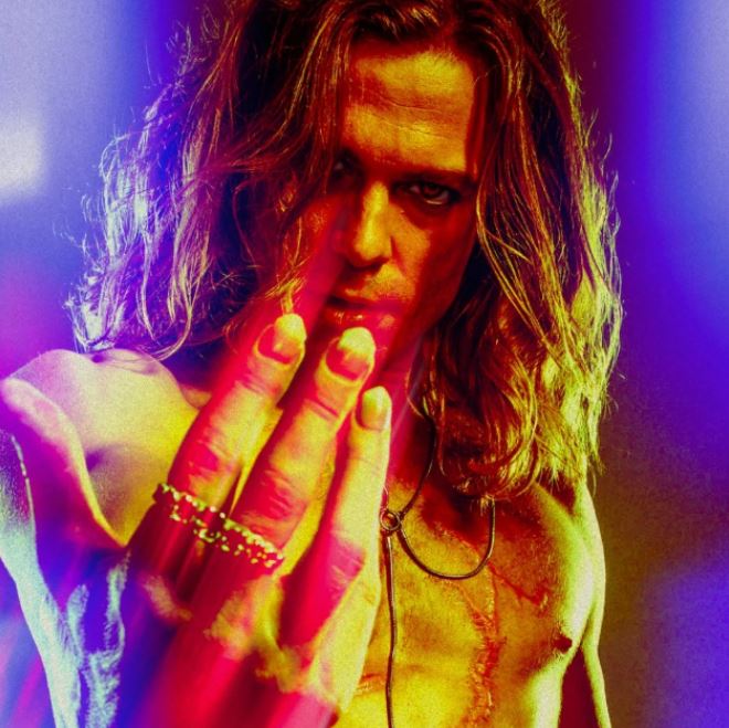 Lestat de Lioncourt under neon stage lights — The Vampire Lestat x AMC, Interview with the Vampire Season 3