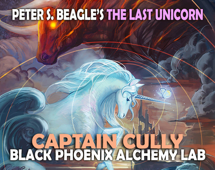Cover of 'The Last Unicorn' featuring a unicorn and dragon with text about Captain Cully and Black Phoenix Alchemy Lab.