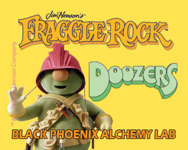 Fraggle Rock Doozers toy with yellow background and branding