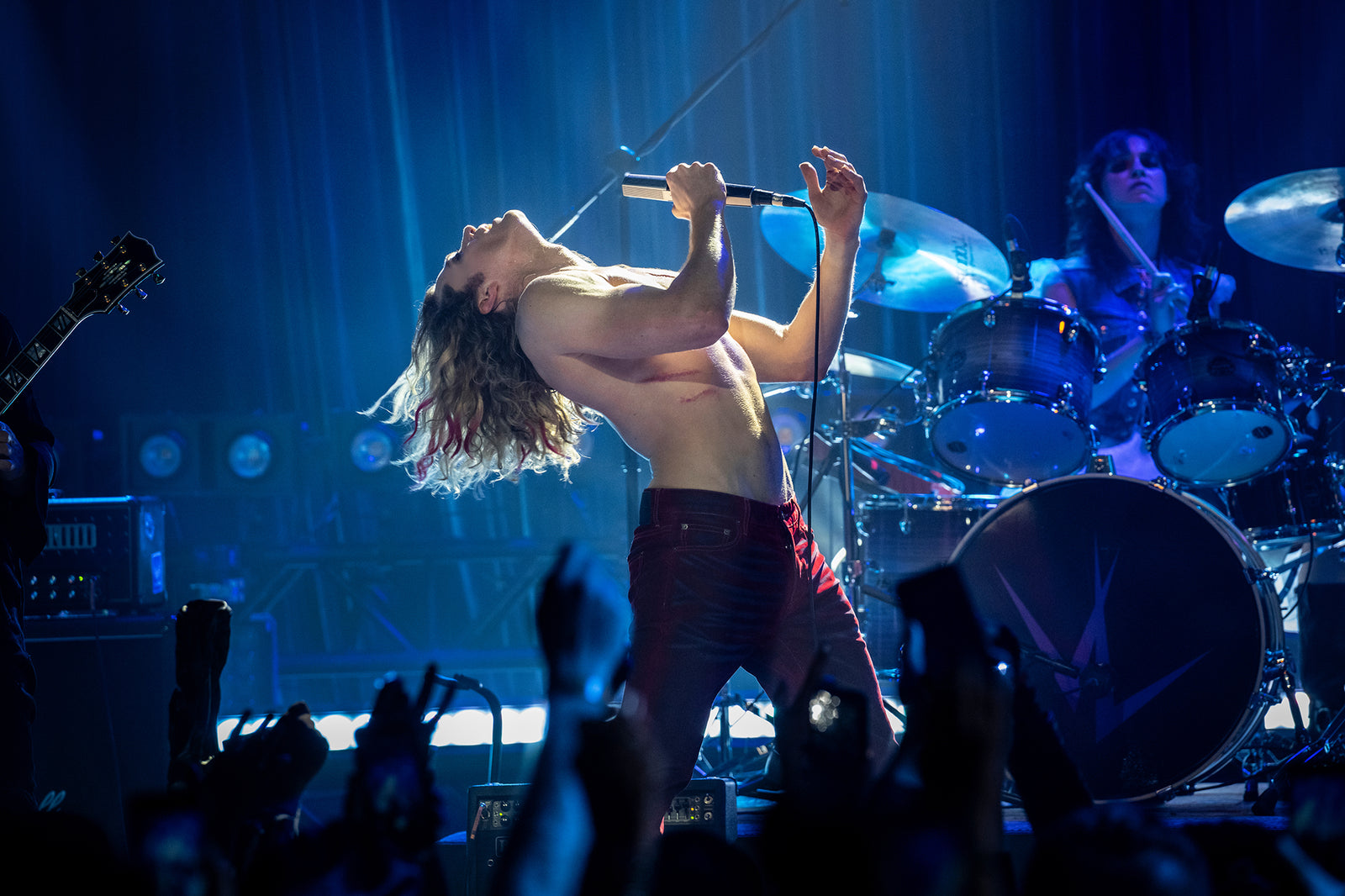 Lestat de Lioncourt performing shirtless under blue stage lights — The Vampire Lestat x AMC, Interview with the Vampire Season 3
