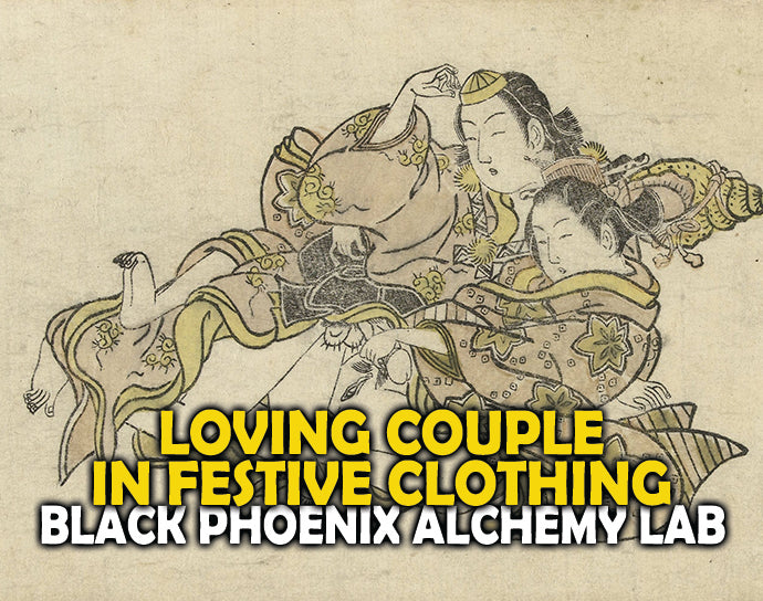 Loving Couple in Festive Clothing Perfume Oil