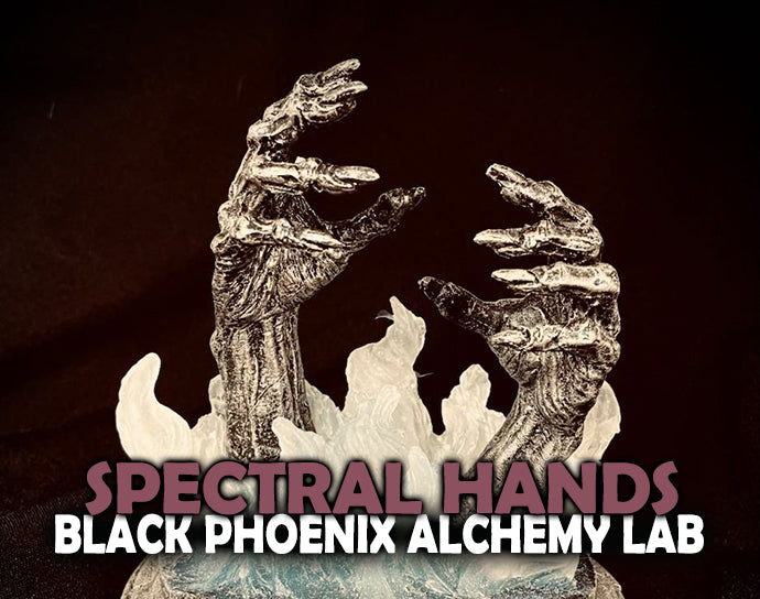 Decorative piece with 'Spectral Hands' by Black Phoenix Alchemy Lab on a dark background