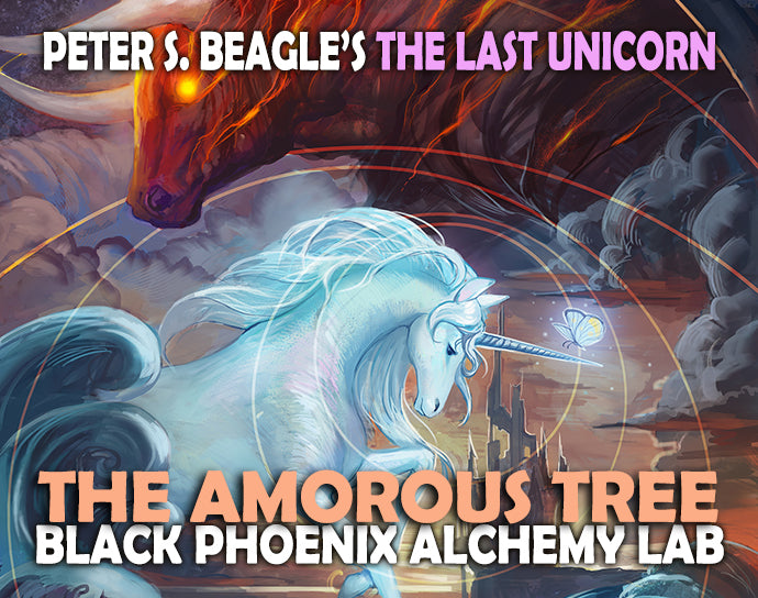 Cover of 'The Last Unicorn' featuring a unicorn and dragon with text about 'The Amorous Tree' and 'Black Phoenix Alchemy Lab'.