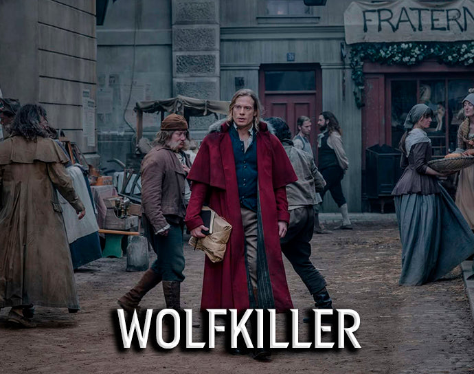 Wolfkiller title card — Lestat de Lioncourt in red coat walking through 18th century Paris market — The Vampire Lestat x AMC, Interview with the Vampire Season 3
