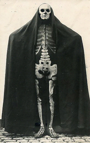 vintage portrait of an unidentified man dressed as a skeleton