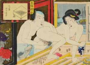 COUPLE IN A BATHHOUSE WITH A GO BOARD